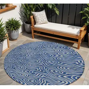 Photo of 8' Navy Blue And Gray Round Abstract Washable Indoor Outdoor Area Rug