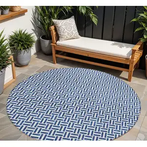 Photo of 8' Navy Blue And Gray Round Geometric Washable Indoor Outdoor Area Rug