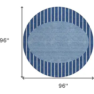 Photo of 8' Navy Blue And Gray Round Striped Washable Indoor Outdoor Area Rug