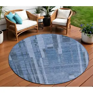 Photo of 8' Navy Blue And Gray Round Striped Washable Indoor Outdoor Area Rug