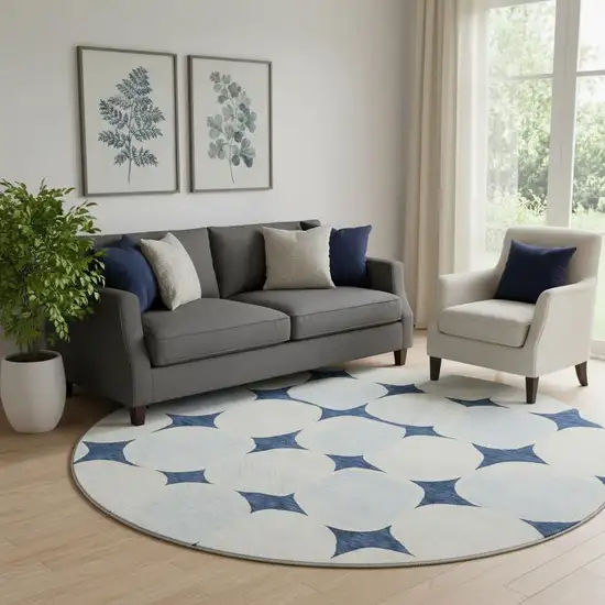 8' Navy Blue And Ivory Abstract Geometric Washable Round Rug With UV Protection Photo 1