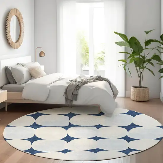 8' Navy Blue And Ivory Abstract Geometric Washable Round Rug With UV Protection Photo 5