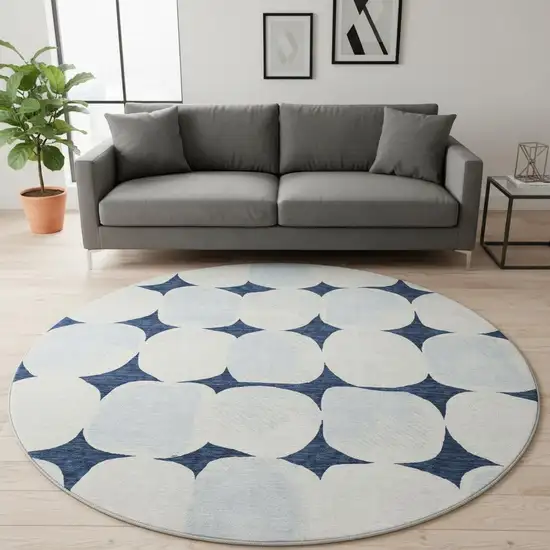 8' Navy Blue And Ivory Abstract Geometric Washable Round Rug With UV Protection Photo 2