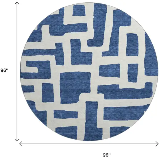 8' Navy Blue And Ivory Abstract Geometric Washable Round Rug With UV Protection Photo 9