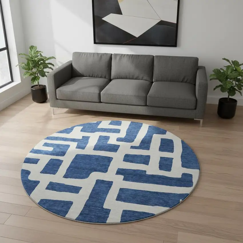 8' Navy Blue And Ivory Abstract Geometric Washable Round Rug With UV Protection Photo 2