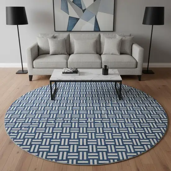 8' Navy Blue And Ivory Abstract Geometric Washable Round Rug With UV Protection Photo 2