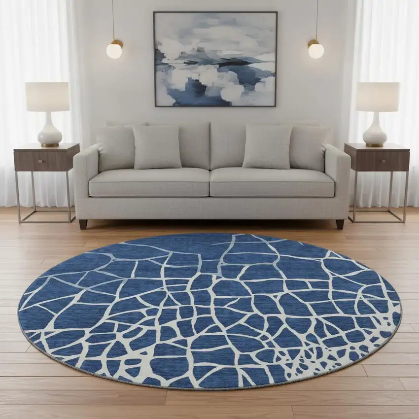 8' Navy Blue And Ivory Abstract Geometric Washable Round Rug With UV Protection Photo 2