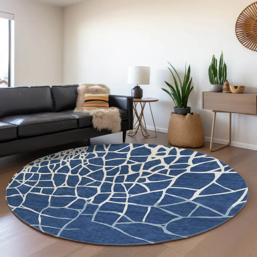 8' Navy Blue And Ivory Abstract Geometric Washable Round Rug With UV Protection Photo 4