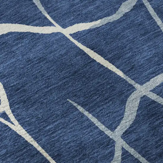 8' Navy Blue And Ivory Abstract Geometric Washable Round Rug With UV Protection Photo 8