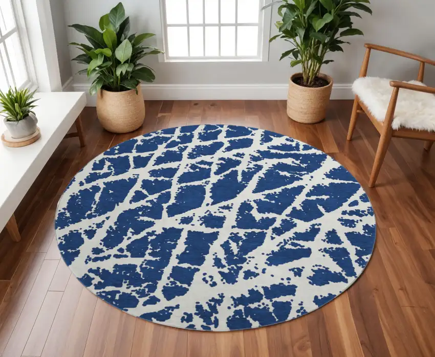 8' Navy Blue And Ivory Abstract Washable Round Rug With UV Protection Photo 2