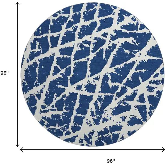 8' Navy Blue And Ivory Abstract Washable Round Rug With UV Protection Photo 3