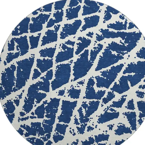 8' Navy Blue And Ivory Abstract Washable Round Rug With UV Protection Photo 4