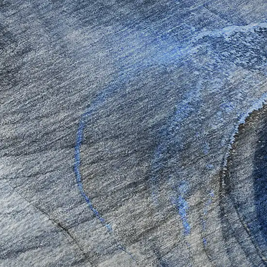 8' Navy Blue And Ivory Abstract Washable Round Rug With UV Protection Photo 9