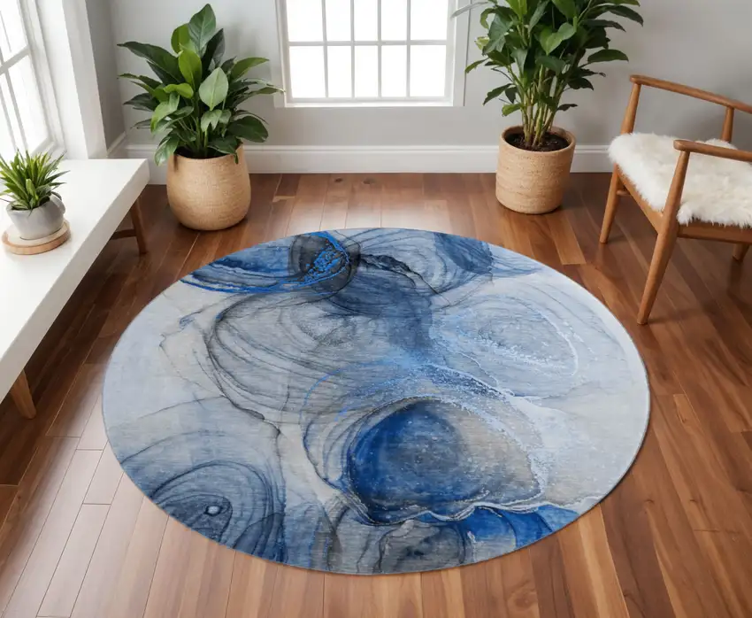 8' Navy Blue And Ivory Abstract Washable Round Rug With UV Protection Photo 2