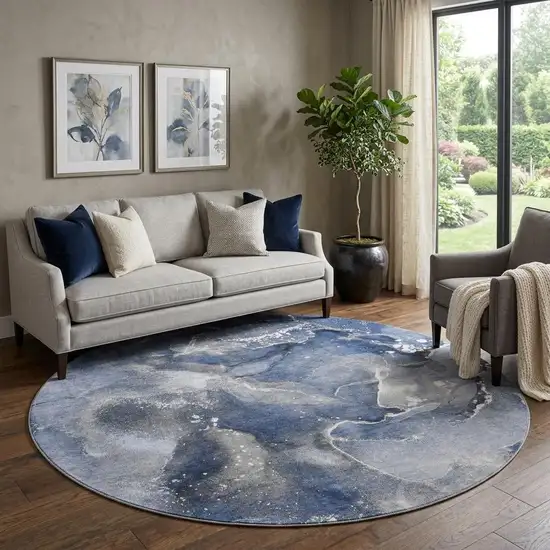 8' Navy Blue And Ivory Abstract Washable Round Rug With UV Protection Photo 1