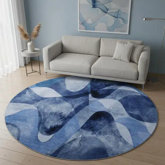8' Navy Blue And Ivory Abstract Washable Round Rug With UV Protection Photo 2