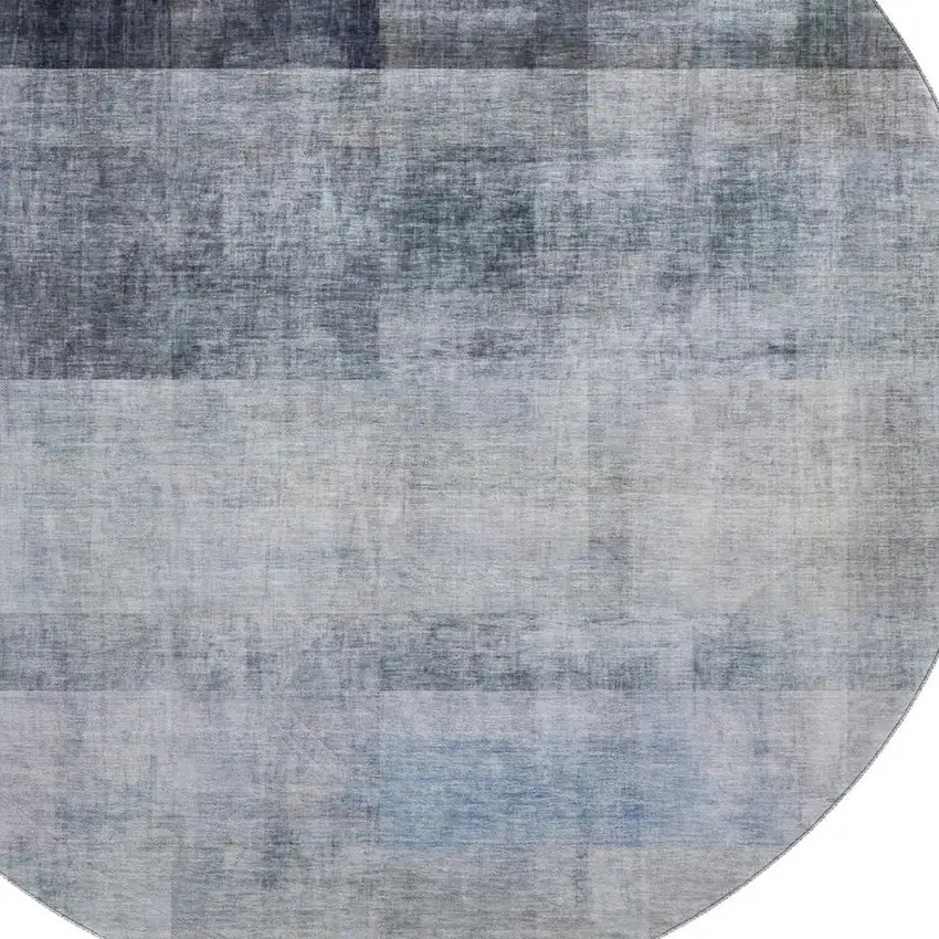 8' Navy Blue And Ivory Abstract Washable Round Rug With UV Protection Photo 3