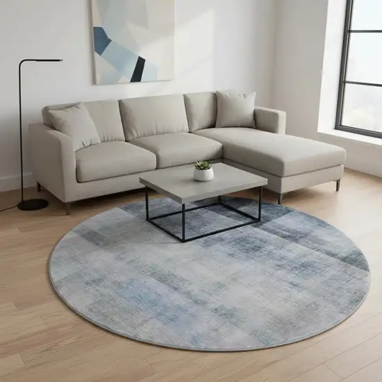 8' Navy Blue And Ivory Abstract Washable Round Rug With UV Protection Photo 2