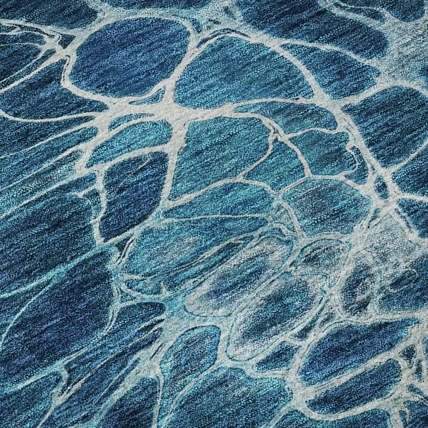 8' Navy Blue And Ivory Abstract Washable Round Rug With UV Protection Photo 9