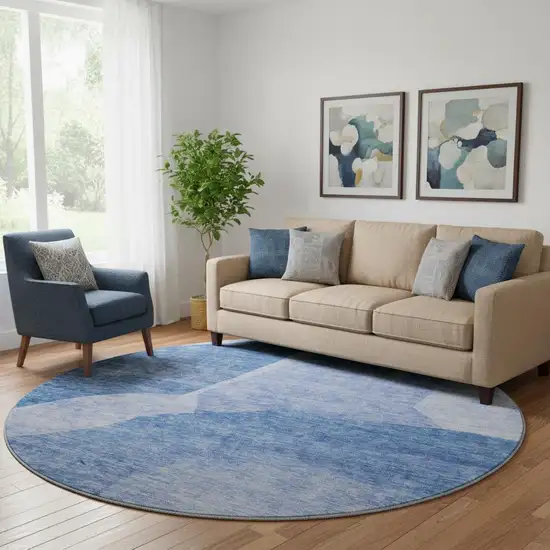 8' Navy Blue And Ivory Abstract Washable Round Rug With UV Protection Photo 1