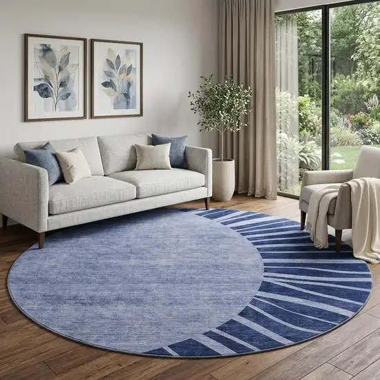 8' Navy Blue And Ivory Abstract Washable Round Rug With UV Protection Photo 1