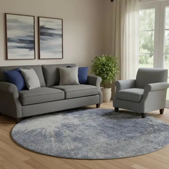 8' Navy Blue And Ivory Abstract Washable Round Rug With UV Protection Photo 1