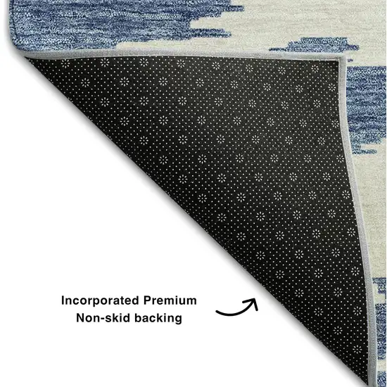 8' Navy Blue And Ivory Abstract Washable Round Rug With UV Protection Photo 6