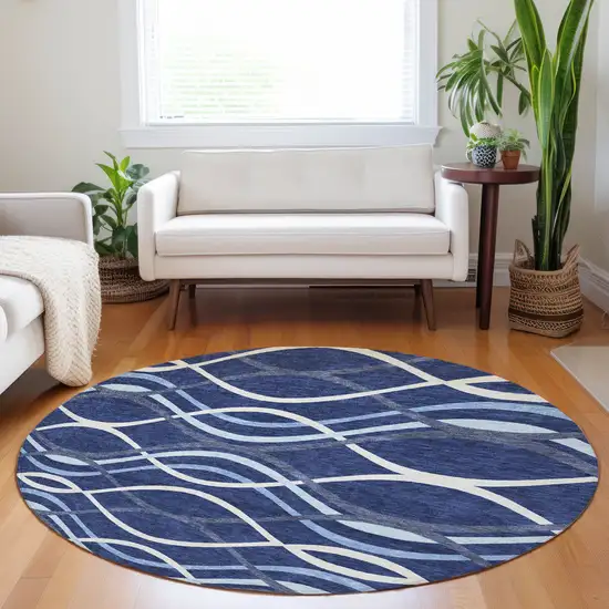 8' Navy Blue And Ivory Abstract Washable Round Rug With UV Protection Photo 5