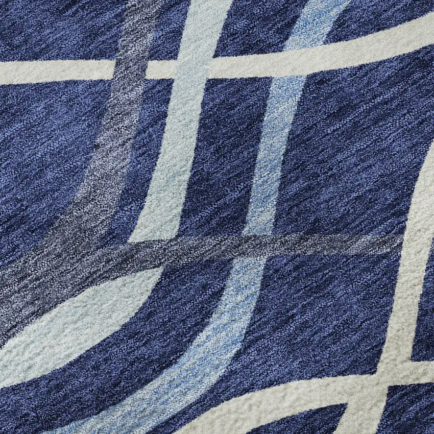 8' Navy Blue And Ivory Abstract Washable Round Rug With UV Protection Photo 9