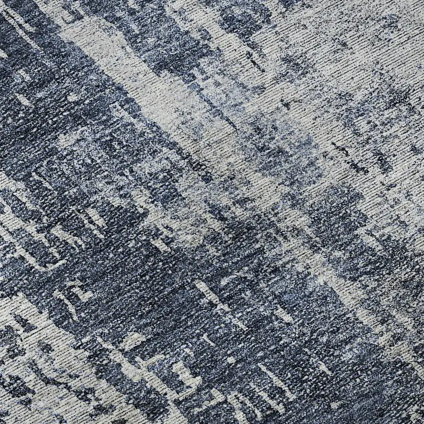 8' Navy Blue And Ivory Abstract Washable Round Rug With UV Protection Photo 9