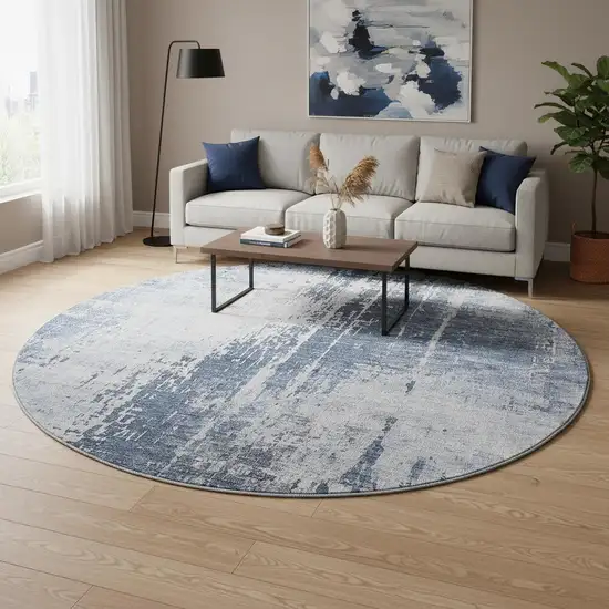8' Navy Blue And Ivory Abstract Washable Round Rug With UV Protection Photo 2