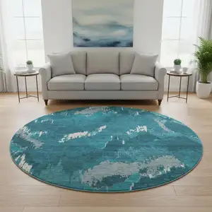 Photo of 8' Navy Blue And Ivory Abstract Washable Round Rug With UV Protection