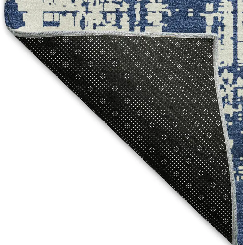 8' Navy Blue And Ivory Abstract Washable Round Rug With UV Protection Photo 6