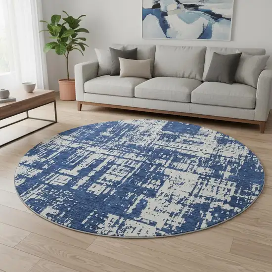 8' Navy Blue And Ivory Abstract Washable Round Rug With UV Protection Photo 2
