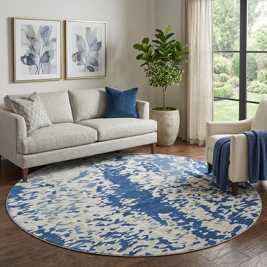 8' Navy Blue And Ivory Abstract Washable Round Rug With UV Protection Photo 1