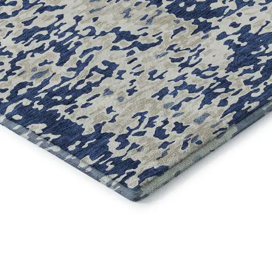 8' Navy Blue And Ivory Abstract Washable Round Rug With UV Protection Photo 6