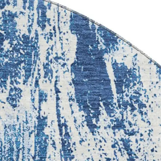 8' Navy Blue And Ivory Abstract Washable Round Rug With UV Protection Photo 2