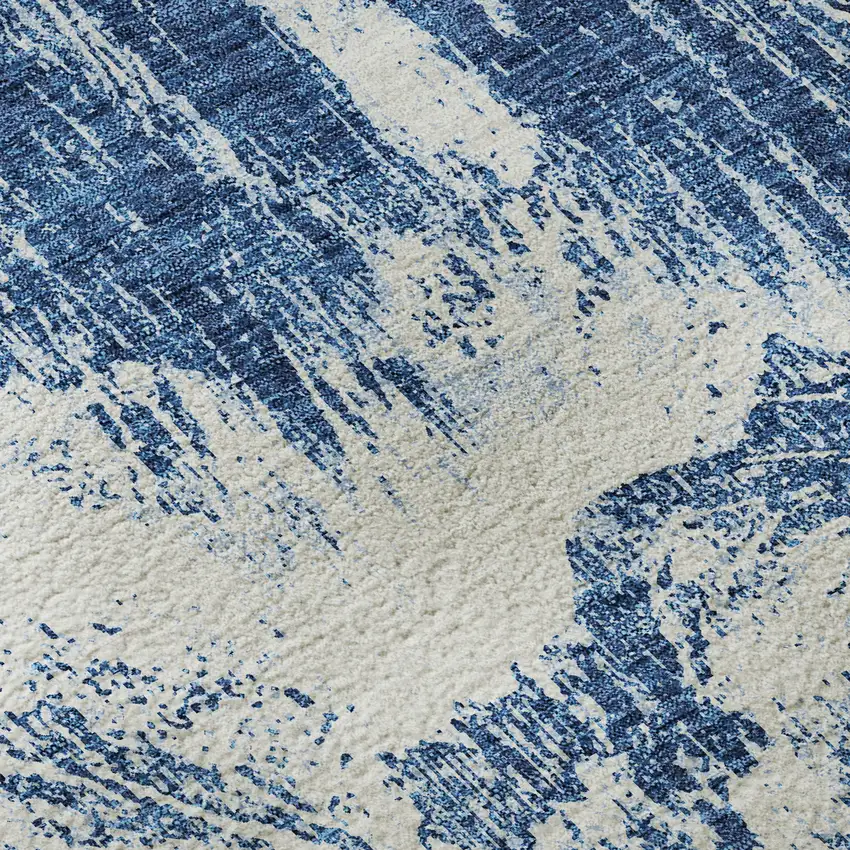 8' Navy Blue And Ivory Abstract Washable Round Rug With UV Protection Photo 8