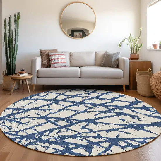 8' Navy Blue And Ivory Abstract Washable Round Rug With UV Protection Photo 4