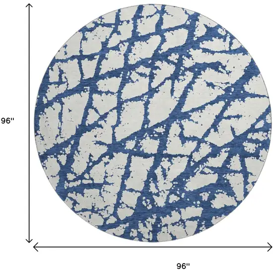 8' Navy Blue And Ivory Abstract Washable Round Rug With UV Protection Photo 9