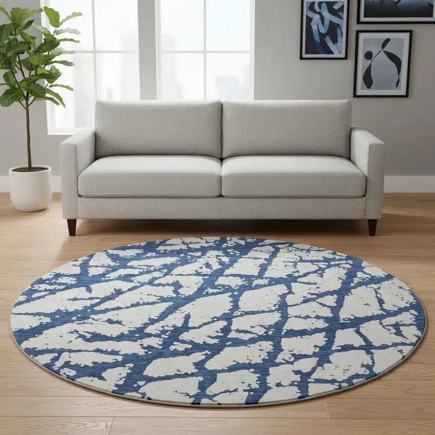 8' Navy Blue And Ivory Abstract Washable Round Rug With UV Protection Photo 2