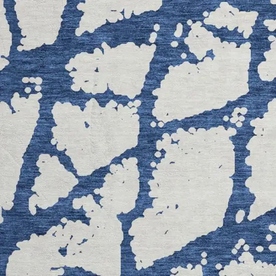 8' Navy Blue And Ivory Abstract Washable Round Rug With UV Protection Photo 3