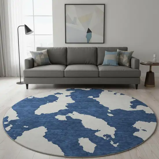 8' Navy Blue And Ivory Abstract Washable Round Rug With UV Protection Photo 2