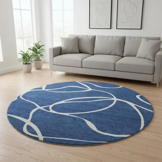 8' Navy Blue And Ivory Abstract Washable Round Rug With UV Protection Photo 2