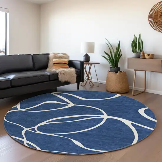 8' Navy Blue And Ivory Abstract Washable Round Rug With UV Protection Photo 4