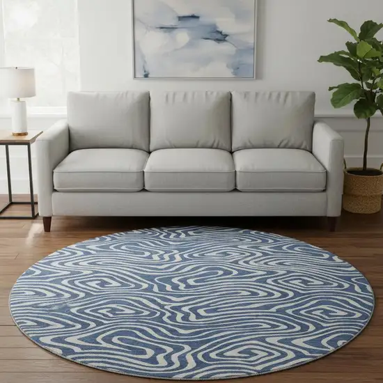 8' Navy Blue And Ivory Abstract Washable Round Rug With UV Protection Photo 2