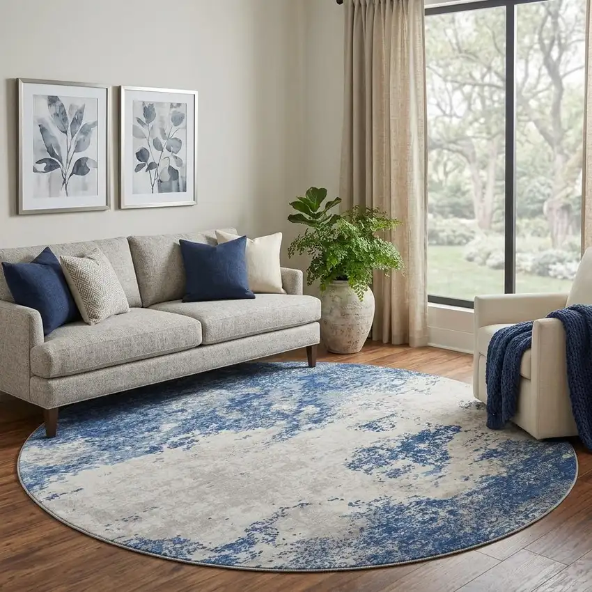 8' Navy Blue And Ivory Abstract Washable Round Rug With UV Protection Photo 1