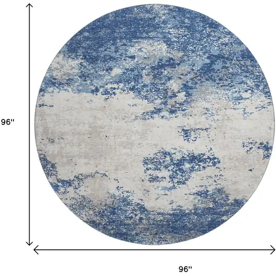8' Navy Blue And Ivory Abstract Washable Round Rug With UV Protection Photo 9