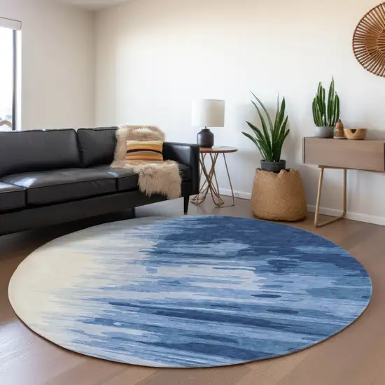 8' Navy Blue And Ivory Abstract Washable Round Rug With UV Protection Photo 4