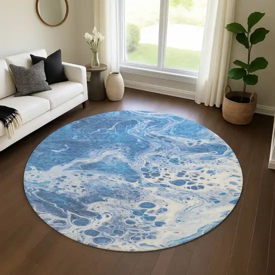 8' Navy Blue And Ivory Abstract Washable Round Rug With UV Protection Photo 4